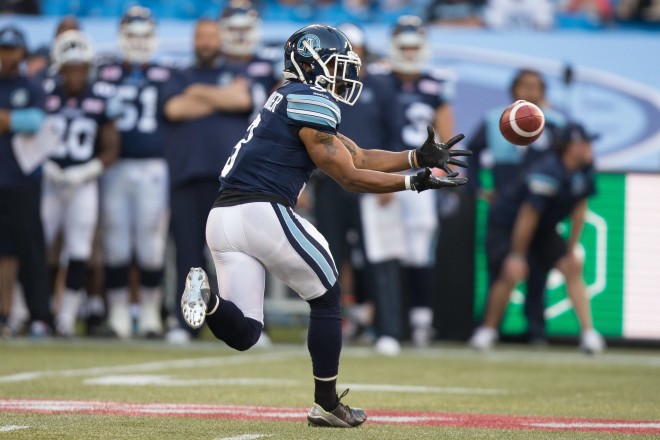 Toronto Argonauts running back Brandon Whitaker catches a pass during the 1st quarter of their CFL game against the Saskatchewan Roughriders in Toronto Ontario, Saturday, August 8, 2015. (CFL PHOTO - Geoff Robins)