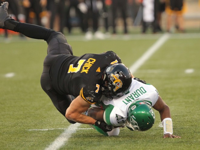 Ticats' John Chick sacks Roughriders' quarterback Darian Durant during first quarter CFL action in Hamilton on Saturday, August 20th, 2016.  (CFL PHOTO - Dave Chidley)