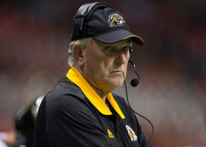 Hamilton Tiger-Cats' head coach June Jones stands on the sideline before a CFL football game against the B.C. Lions in Vancouver, B.C., on Friday September 22, 2017. THE CANADIAN PRESS/Darryl Dyck
